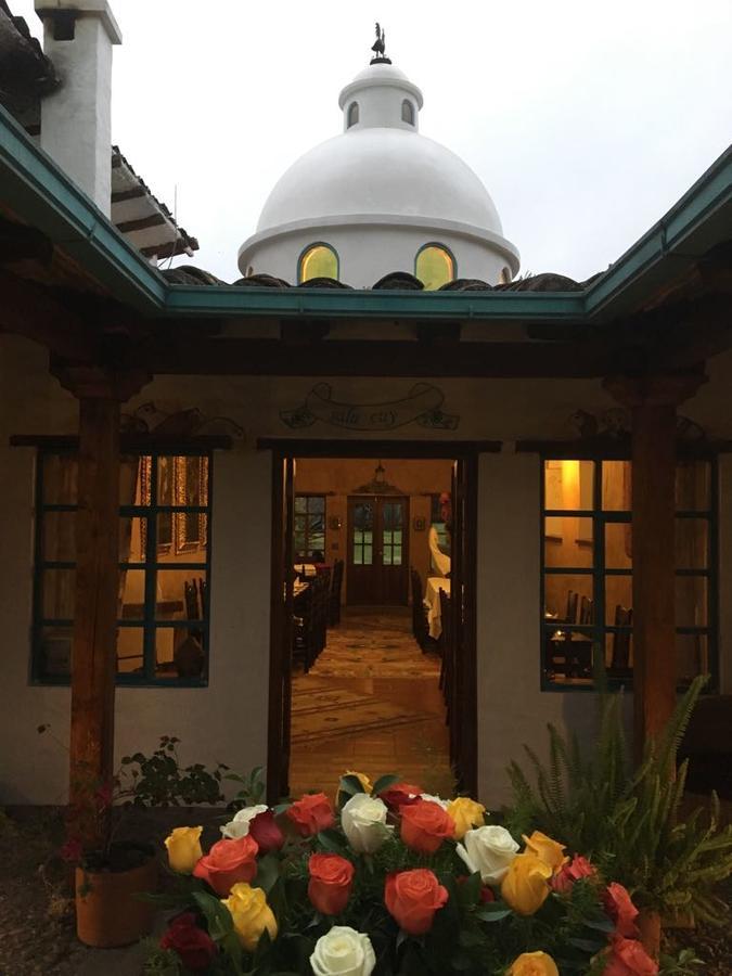 Las Palmeras Inn Otavalo Esterno foto